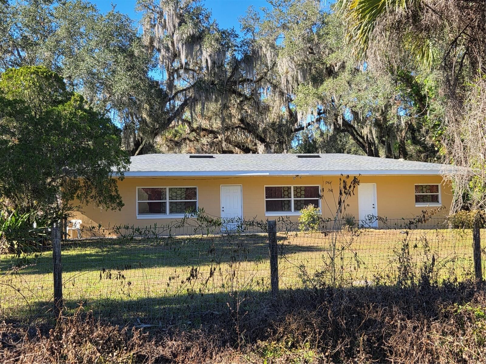 Property Photo:  1212 S State Road 415  FL 32168 
