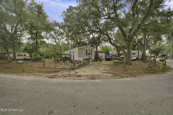 Property Photo:  22155 Bayou Portage Street  MS 39560 