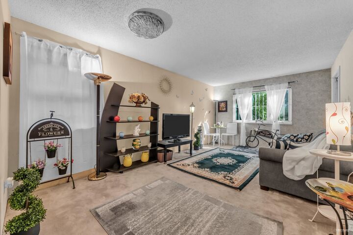 Property Photo: 1122 King Albert Avenue 111 BC V3J 1X7