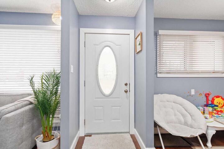 Property Photo:  109 Ross Street  AB T9K 1B3 