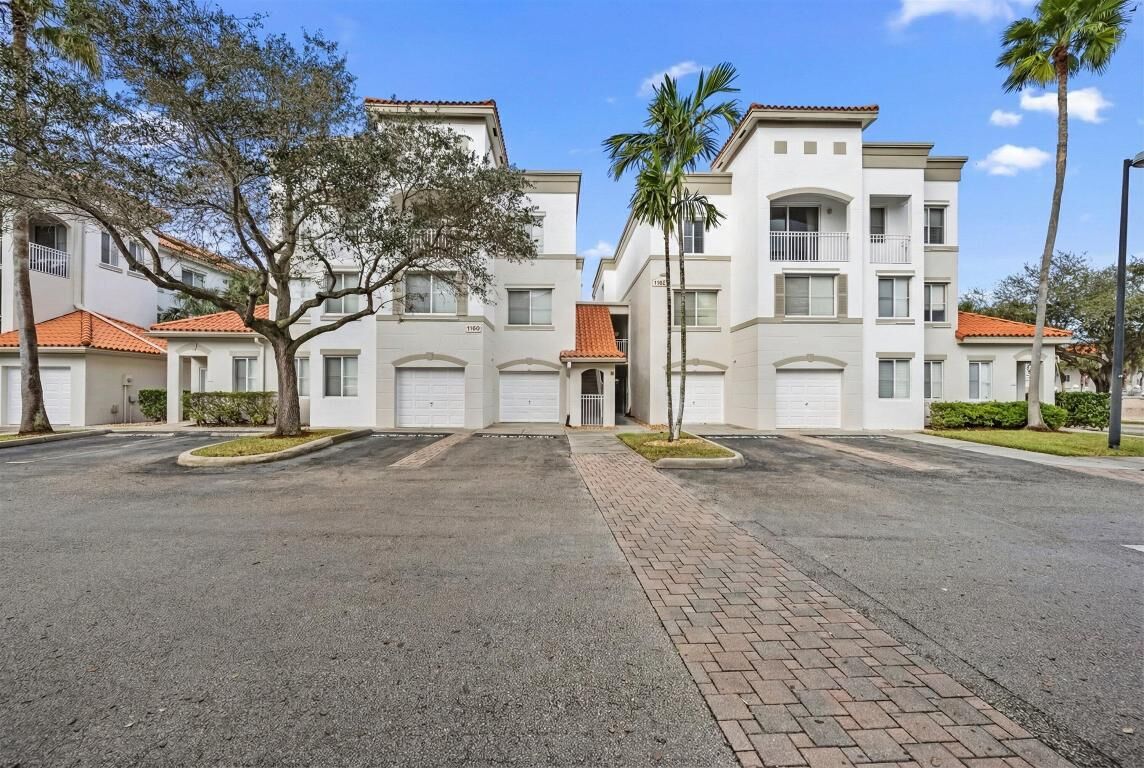 Property Photo:  11022 Legacy Drive 205  FL 33410 