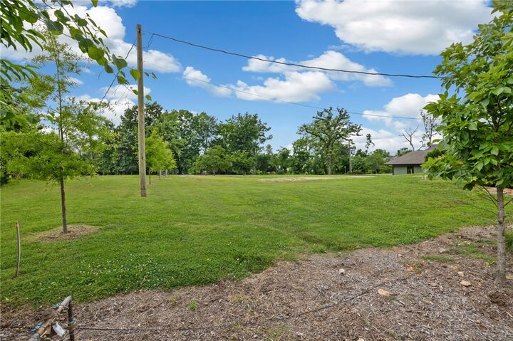 Property Photo:  Lot 7 NW D Street  AR 72712 