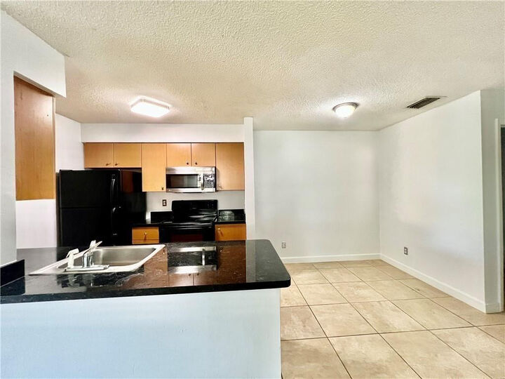Property Photo:  741 NW 104th Avenue 203  FL 33026 
