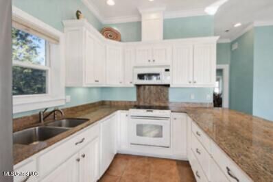 Property Photo:  470 W Beach Boulevard  MS 39560 