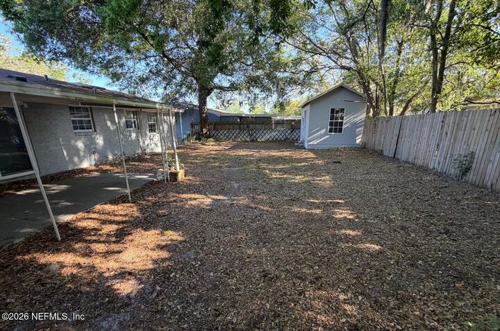 Property Photo:  5725 Hillman Drive  FL 32244 
