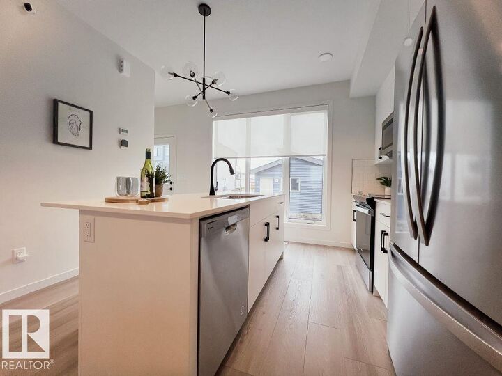 Property Photo:  7446 Klapstein Crescent SW  AB T6W 0A6 