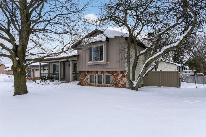 Property Photo:  5875 Brookfarm Drive SE  MI 49508 