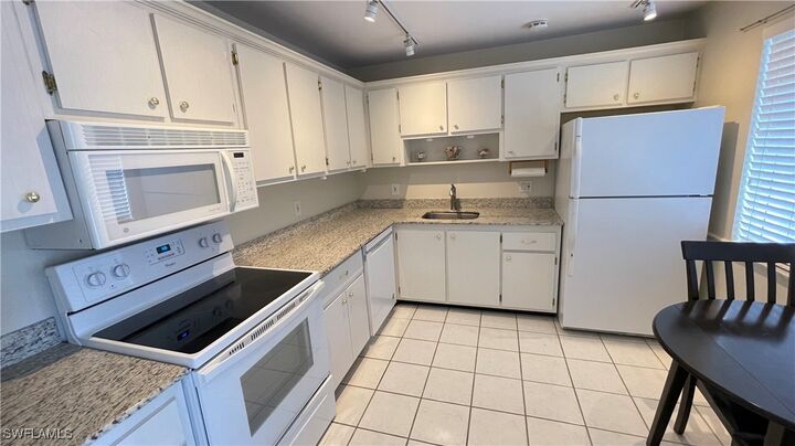 Property Photo:  801 Teryl Road 4  FL 34112 