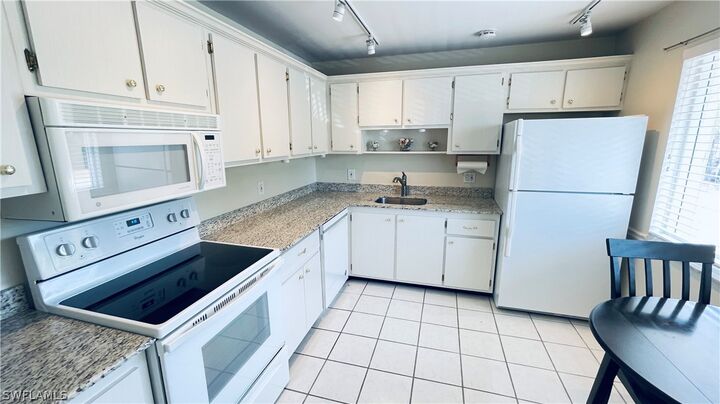 Property Photo:  801 Teryl Road 4  FL 34112 