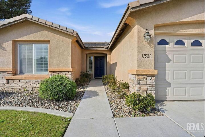 Property Photo:  11528 Indian Hawthorne Street  CA 93311 