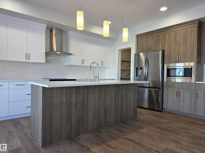 Property Photo:  19011 20 Avenue NW  AB T6M 3E8 