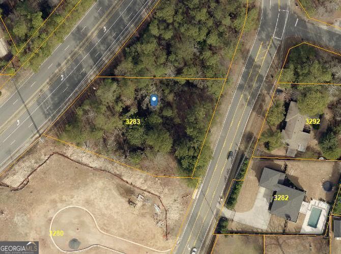 Property Photo:  3283 Holly Springs Road  GA 30062 