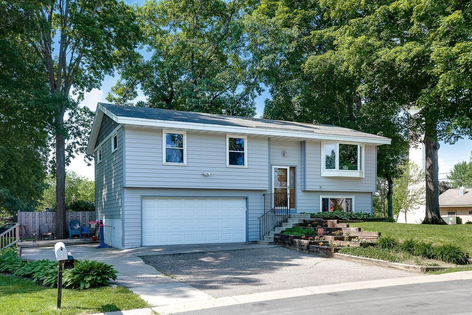 Property Photo:  5079 Woodridge Road  MN 55364 