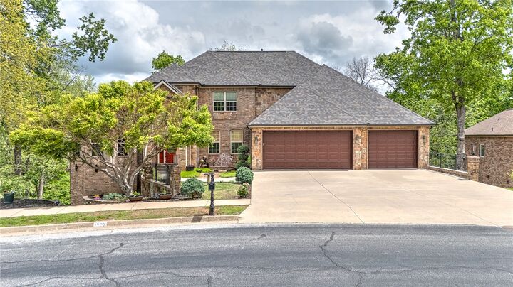 Property Photo:  1502 NE Bluff Spring Avenue  AR 72712 