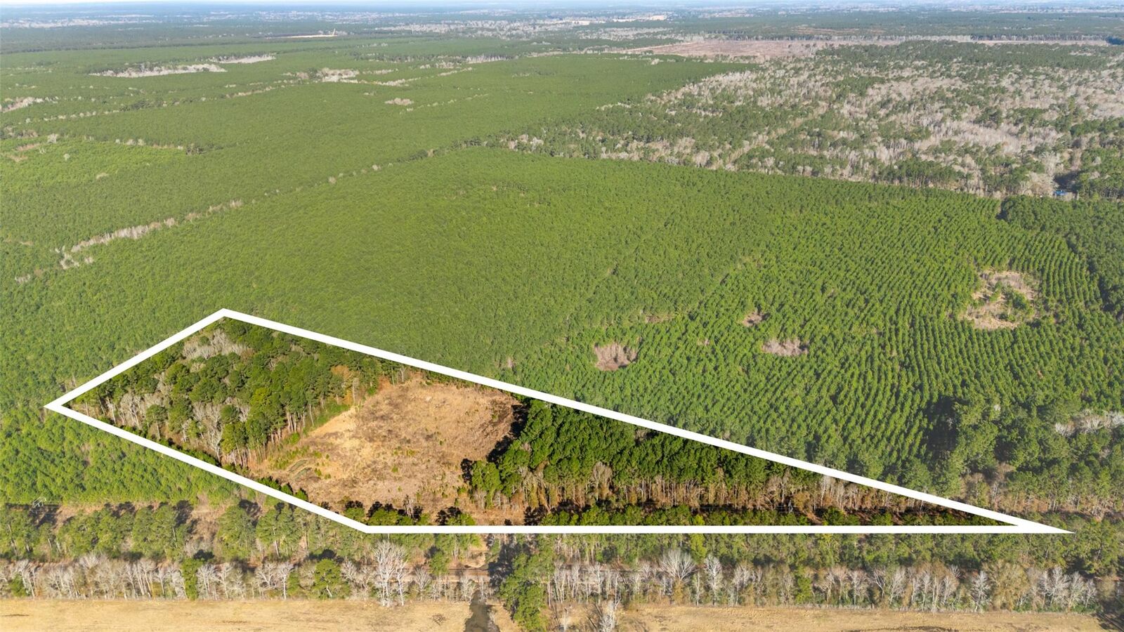 Property Photo:  1495 County Road 2200  TX 77327 