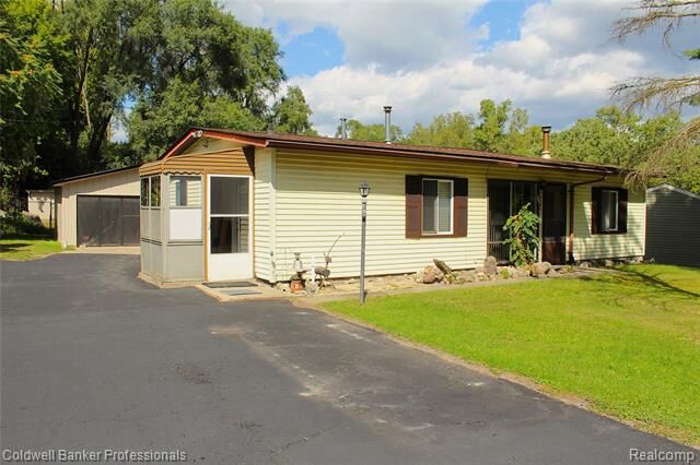 Property Photo:  10593 9 Mile Road  MI 48189 