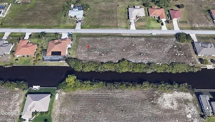 Property Photo:  2042 NW 4th Street  FL 33993 