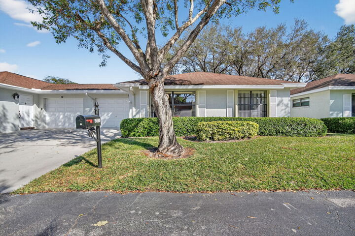 Property Photo:  9890 Orchid Tree Trail B  FL 33436 