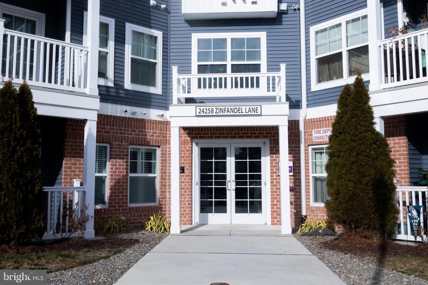 Property Photo:  24258 Zinfandel Lane #103  DE 19958 