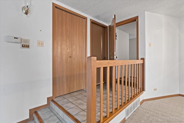 Property Photo:  1258 Chalet Road 201  IL 60563 