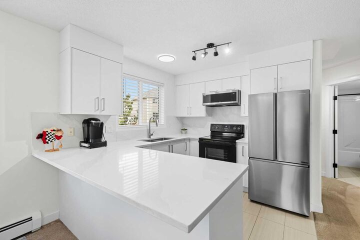 Photo de la propriété:  7451 Springbank Boulevard SW 1211  AB T3H 4K5 