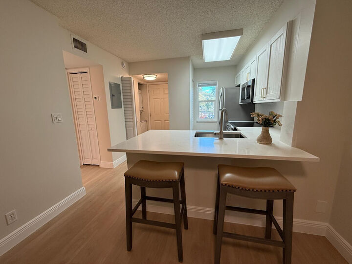 Property Photo:  2106 S Cypress Bend Drive 210  FL 33069 