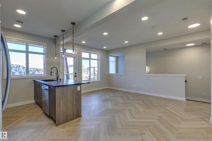 Property Photo: 16231 19 Avenue SW 20 AB T6W 5C6