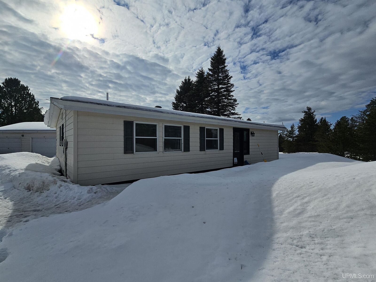 Property Photo:  120 Caribou Street  MI 49841 