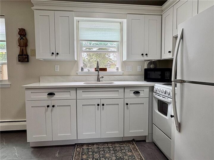 Property Photo:  70 Carroll Avenue 1210  RI 02840 