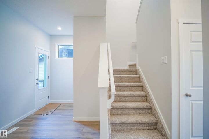 Property Photo:  113 Ficus Way  AB T8L 0Z6 