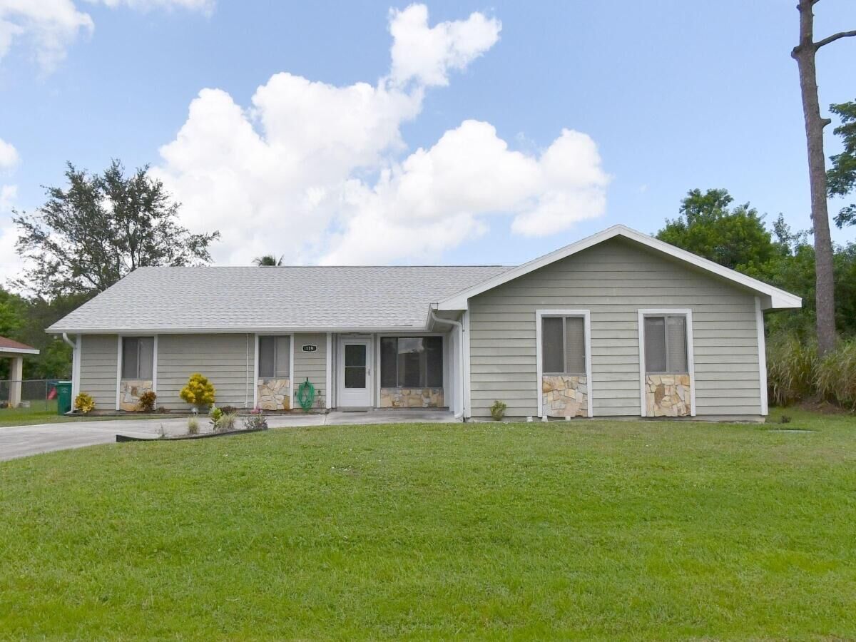 Property Photo: 119 SW Fairchild Avenue FL 34984