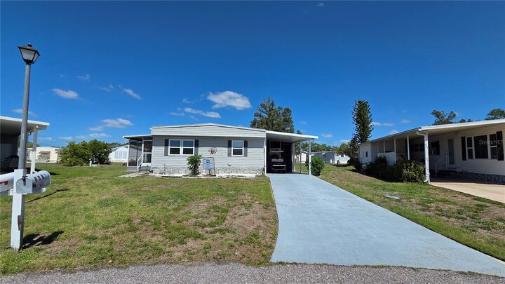 Property Photo:  6881 Holo Court  FL 34287 