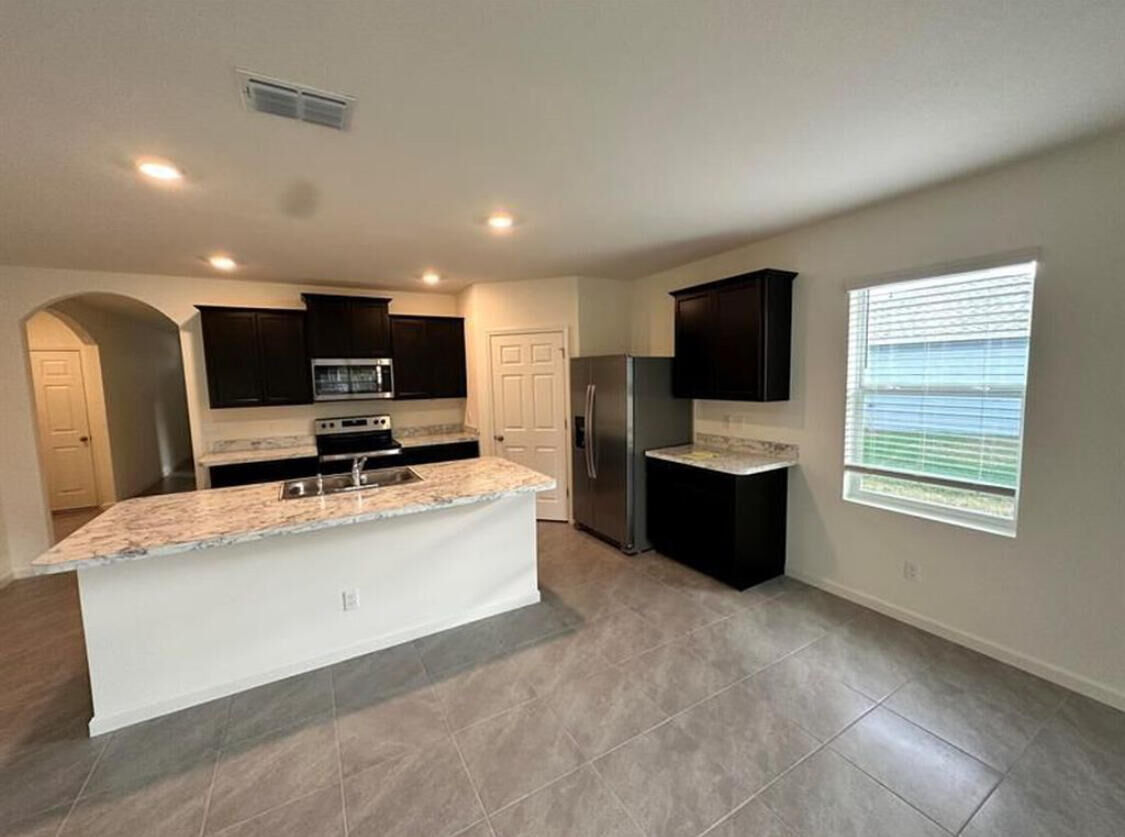 Property Photo: 311 SW Aero Circle FL 34953