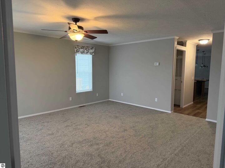 Property Photo:  1211 Wellington Drive  MI 48858 