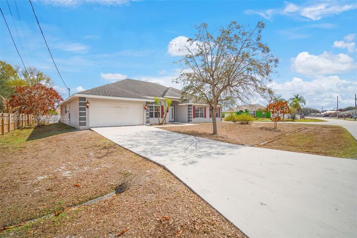 Property Photo:  6762 NW Daffodil Ln  FL 34983 