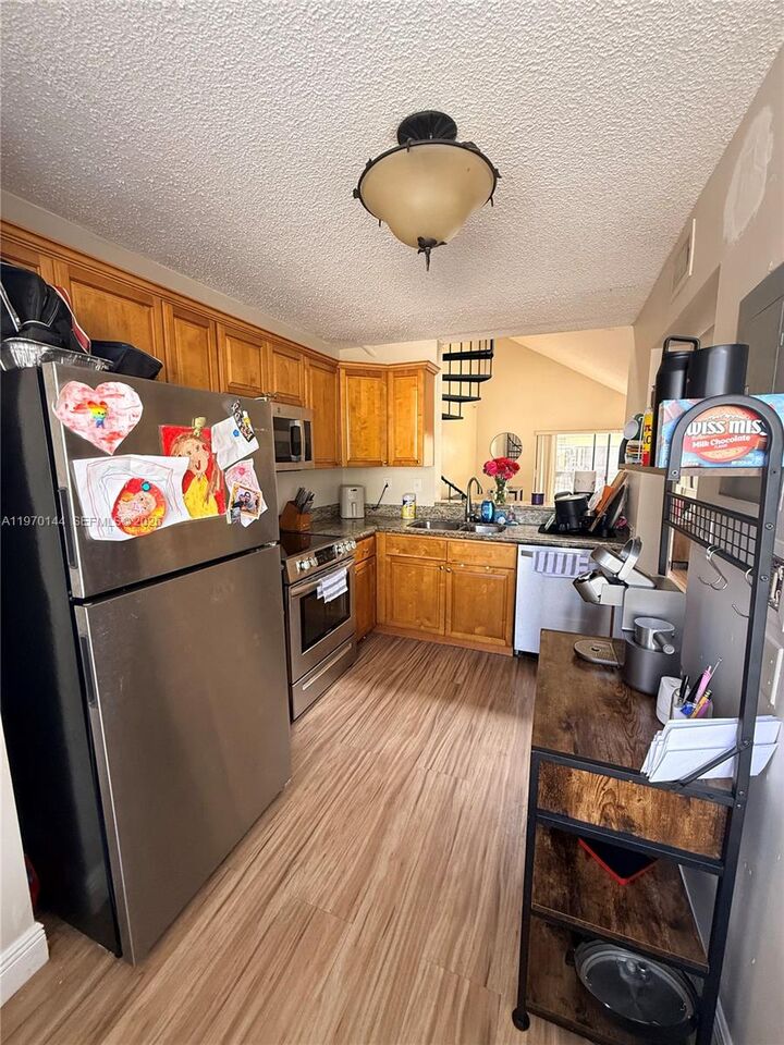 Property Photo:  12906 SW 88th Ter B-202  FL 33186 