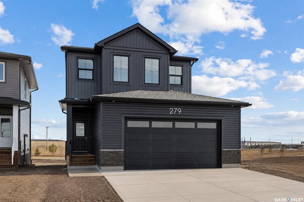 Property Photo: 279 Nazarali Way SK S7V 1X6