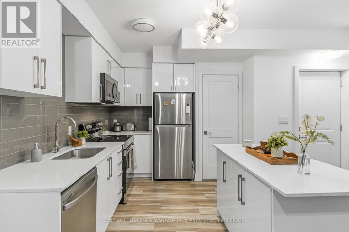 Property Photo:  6065 McLeod Road 103  ON L2G 0Z7 