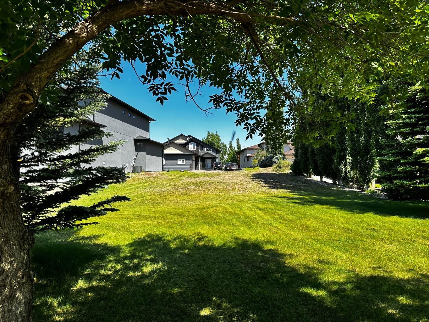 Property Photo: 13 Blue Heron View AB T1R 0X5
