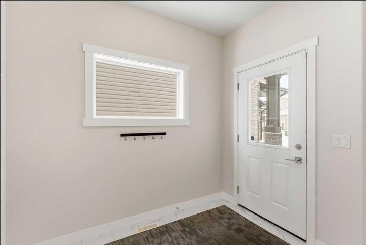 Property Photo:  42 Baysprings Way SW  AB T4B 3V1 