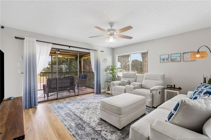 Property Photo:  6940 SE Constitution Boulevard 206  FL 33455 