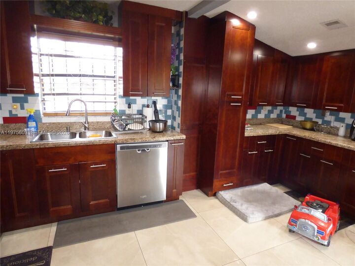 Property Photo:  18813 NW 32nd Ave  FL 33056 