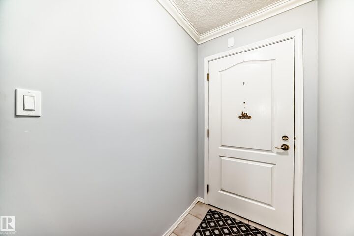 Property Photo: 13450 114 Avenue NW 302 AB T5M 4C4