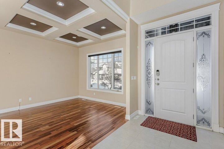 Property Photo: 1211 Adamson Drive SW AB T5W 0V5