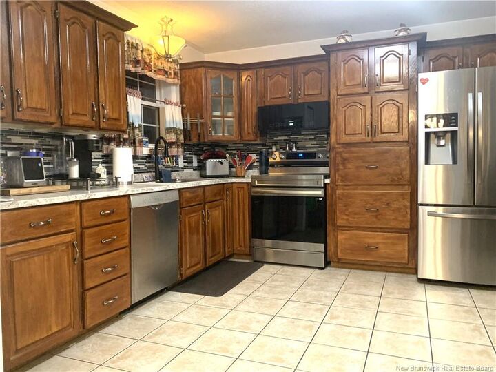 Property Photo: 50 Clarence Street NB E2V 4C6