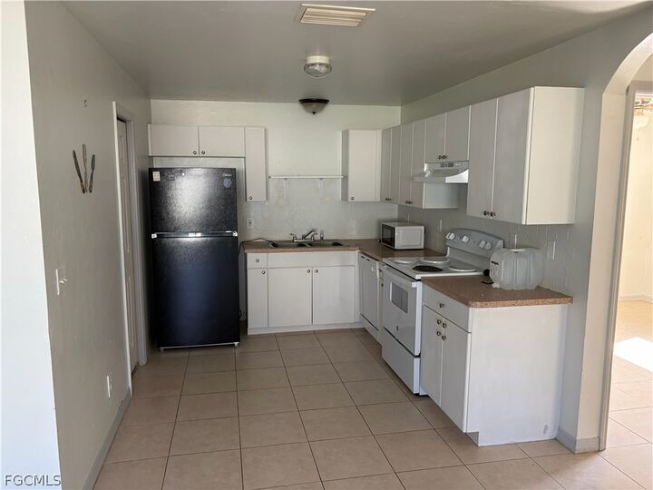 Property Photo:  2439 Richard Avenue S  FL 33973 