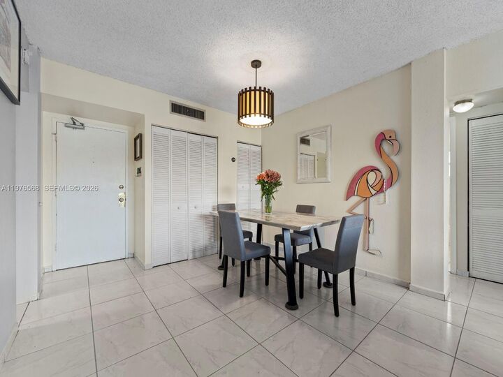Property Photo:  6701 NW 169th St B304  FL 33015 