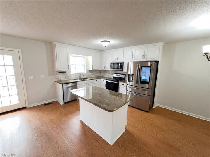 Property Photo:  332 Cutty Sark Road  NC 27103 