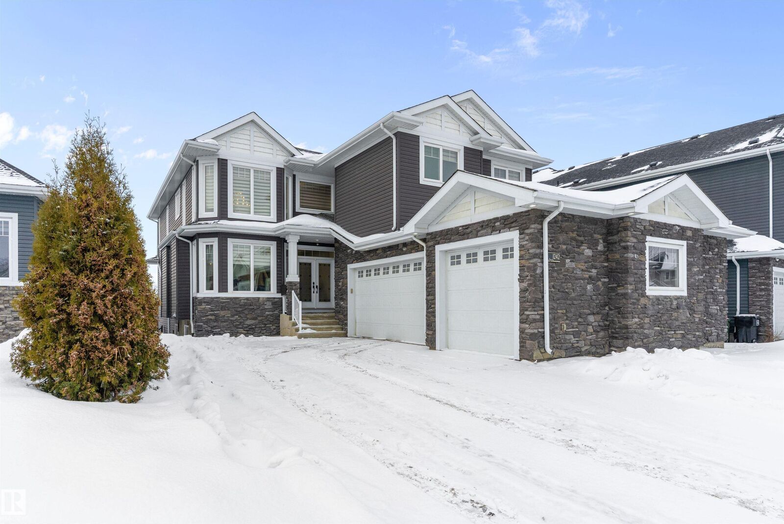 Property Photo: 1242 Starling Drive NW AB T5S 0K4