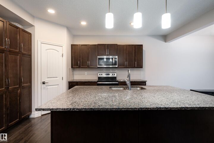 Property Photo:  1245 26A Street NW  AB T6T 2J4 